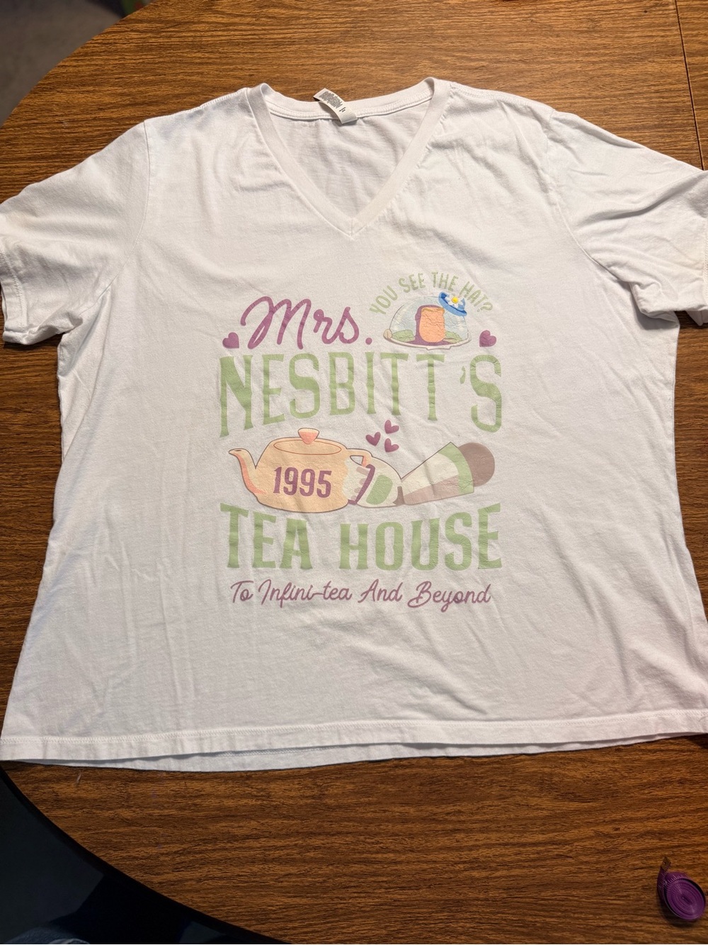 Mrs. Nesbitt's Tea House Graphic V-Neck Tee - White